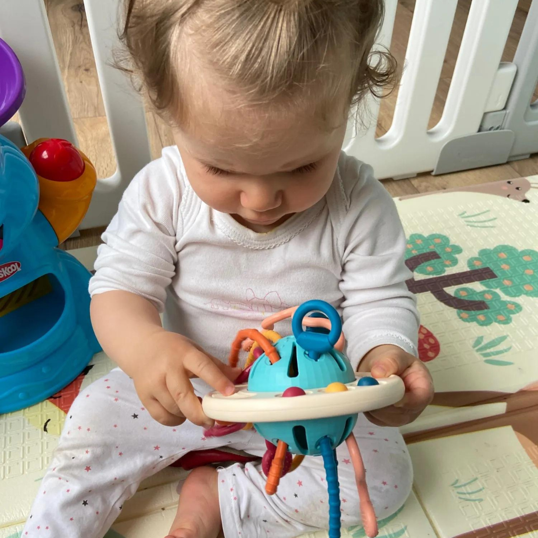 Captivating Curiosity: Unveiling the Sensory Development Pull-String Rattle at Baby Explores